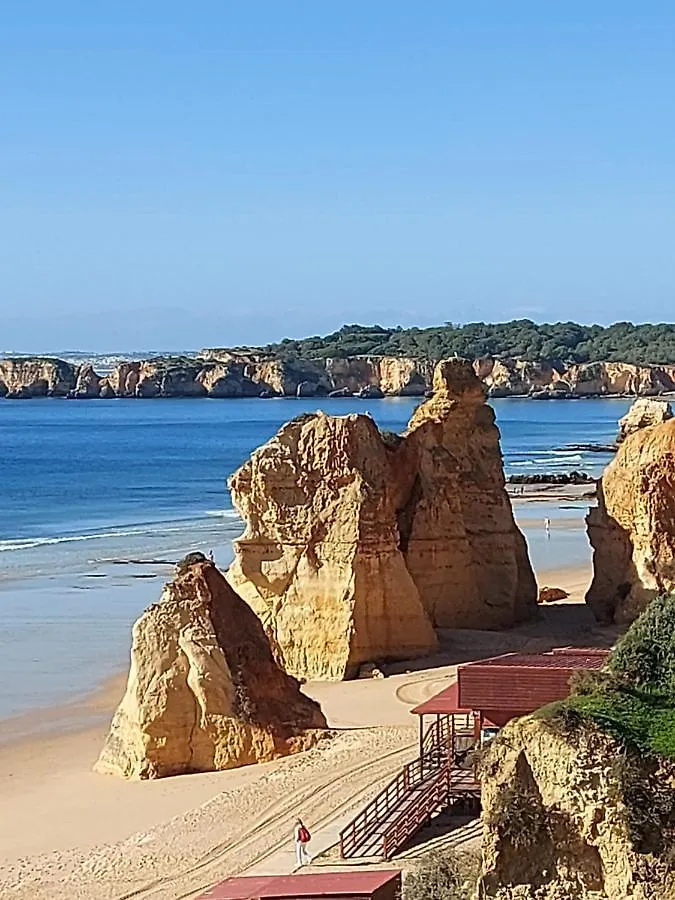 Apartamento em frente à praia com piscina e ténis Portimão